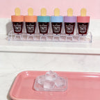 Tinta Labial Dear Darling en exhibidor de acrílico